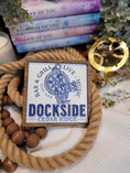 Load image into Gallery viewer, wooden sign with compass and anchor design. Dockside Bar and Grill logo on the sign.