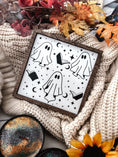 Load image into Gallery viewer, Boo Books Shelf Sign. A white. wooden square sign with a wood frame featuring illustrations of ghosts, books and stars. 2023 FireDrake Artistry®