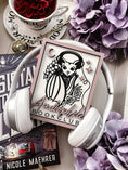 Load image into Gallery viewer, Audiophile Book Club Sign. White wooden sign with a lilac border. Bat design with headphones surrounded by flowers, with words below that read "Audiophile Book Club". 2023 FireDrake Artistry®