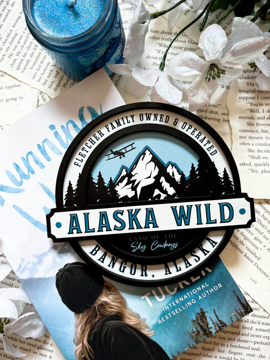 Officially Licensed K.A. Tucker "Alaska Wild Round Sign" created by Fire Drake Artistry© 