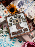Load image into Gallery viewer, Sign with "In MY Cowboy Romance Era" and cowboy boots with flowers printed on it. Books and flowers in the background.