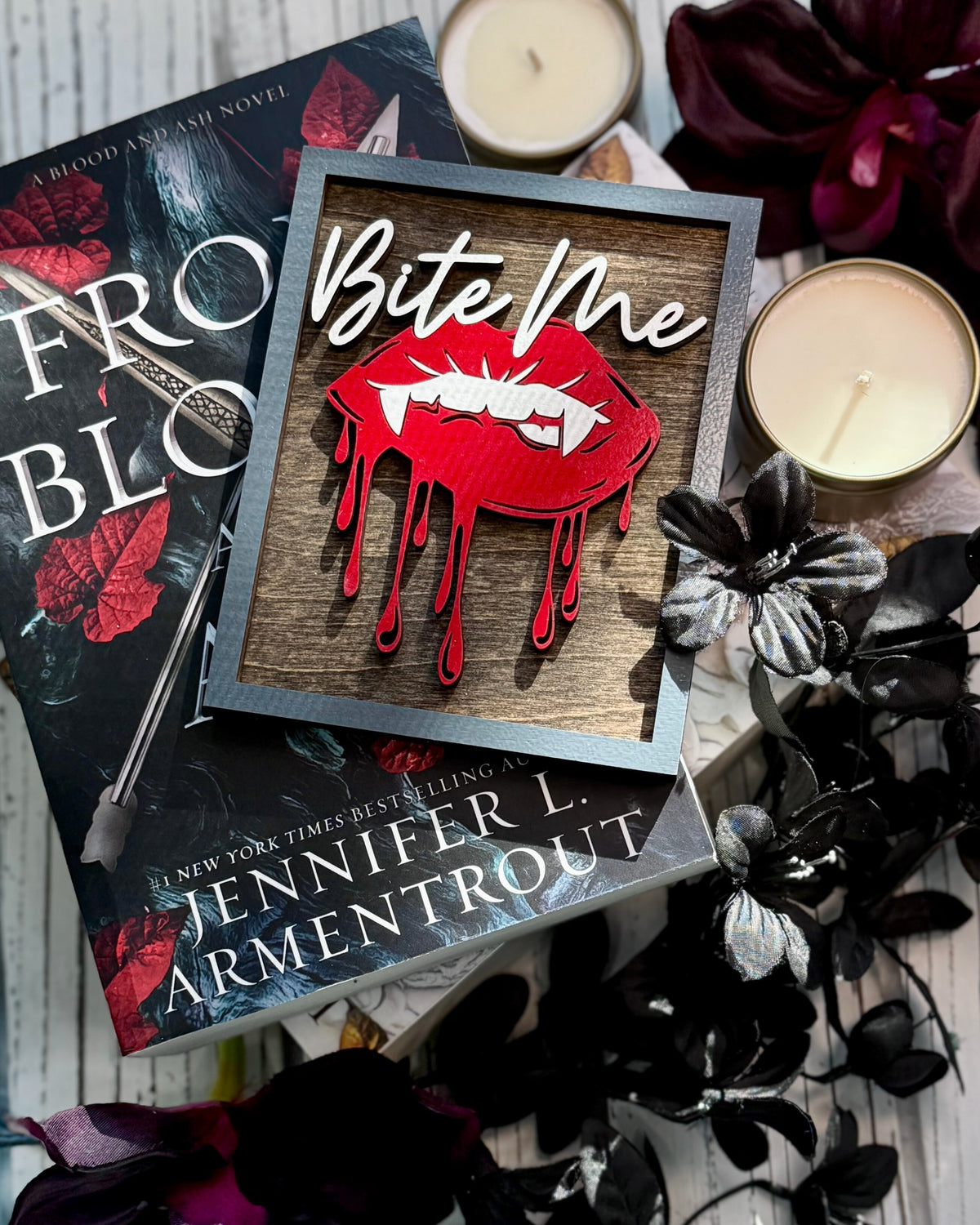 Bite Me Shelf Sign - FireDrake Artistry® wooden sign with natural background, dark grey frame, white "Bite Me" wording and red vampire lips. 