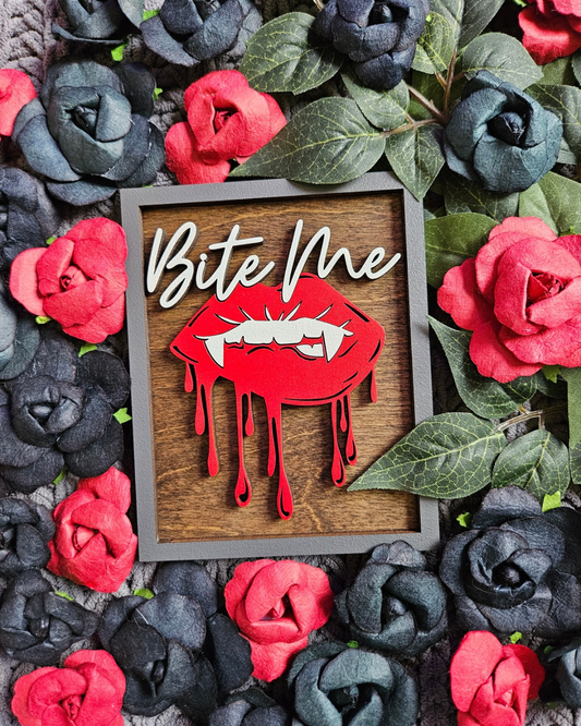 Bite Me Shelf Sign - FireDrake Artistry® wooden sign with natural background, dark grey frame, white "Bite Me" wording and red vampire lips. 
