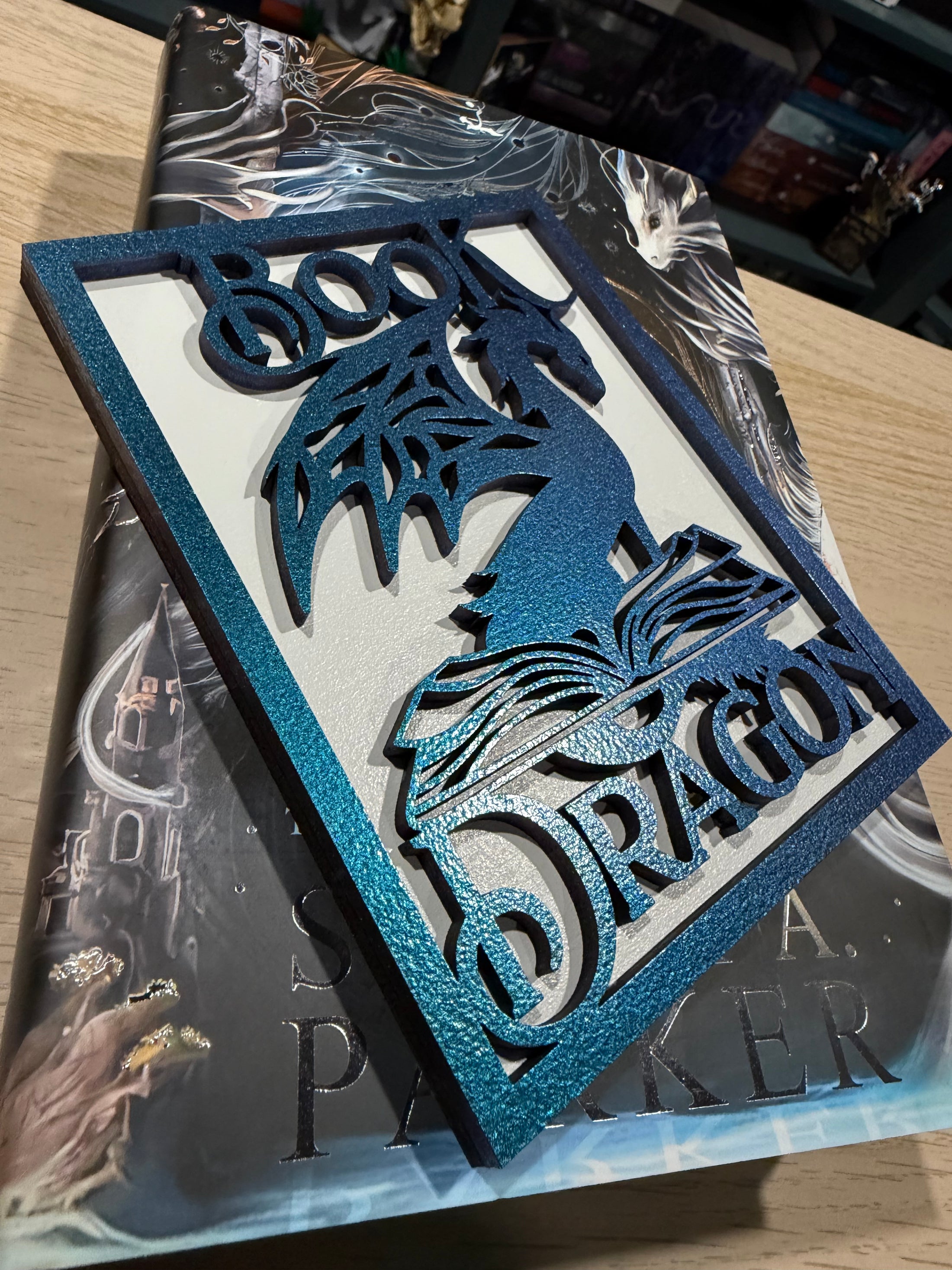 Book Dragon Sign