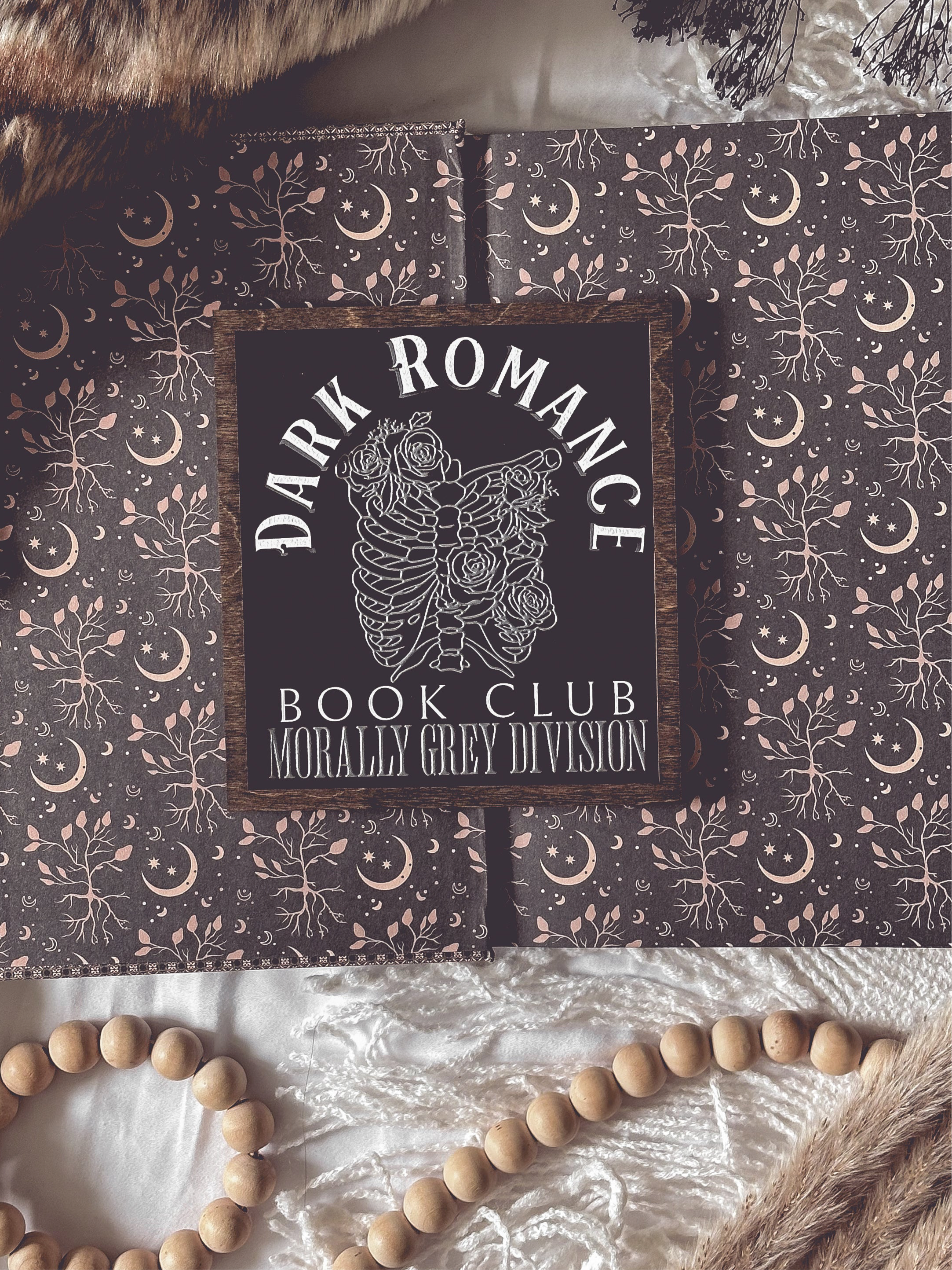 Dark Romance Book Club Sign . A decorative wooden book club sign with a dark brown border and black background. UV printed design that reads "DARK ROMANCE" at the top, and "Book Club Morally Grey Division" on the bottom. 2025 FireDrake Artistry®