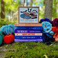 Load image into Gallery viewer, Fall Booked Up Sign - Multicolor Version- ©️ Fire Drake Artistry 2025. Wooden sign with white background and wood stained frame, UV printed design with a cluster of pumpkins beside a stack of books and bats flying around. 
