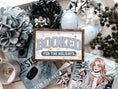 Load image into Gallery viewer, Decorative sign with a wooden frame that reads 'Booked for the Holidays' in blue on a white background. © FireDrake Artistry 2025.
