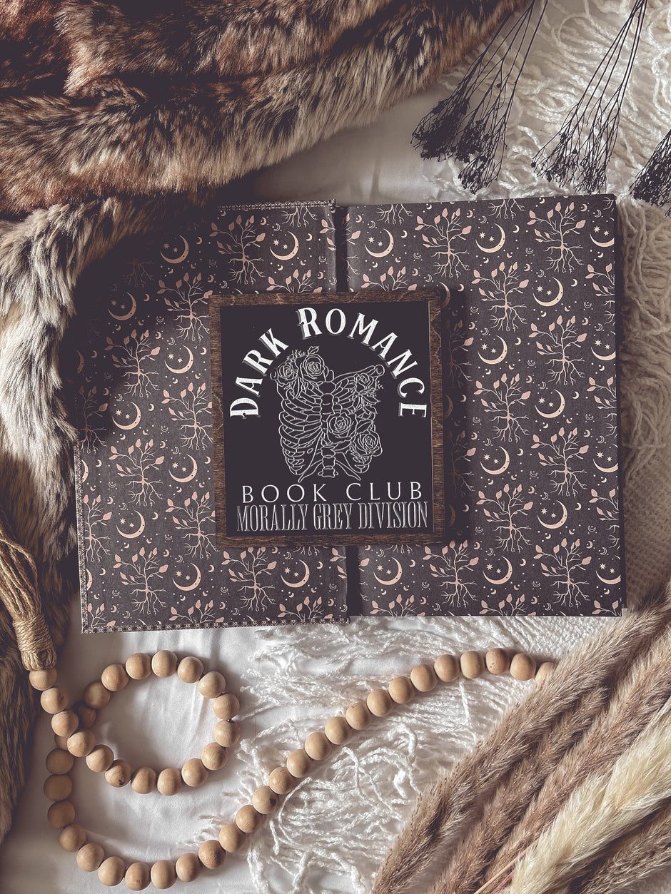 Dark Romance Book Club Sign . A decorative wooden book club sign with a dark brown border and black background. UV printed design that reads "DARK ROMANCE" at the top, and "Book Club Morally Grey Division" on the bottom. 2025 FireDrake Artistry®