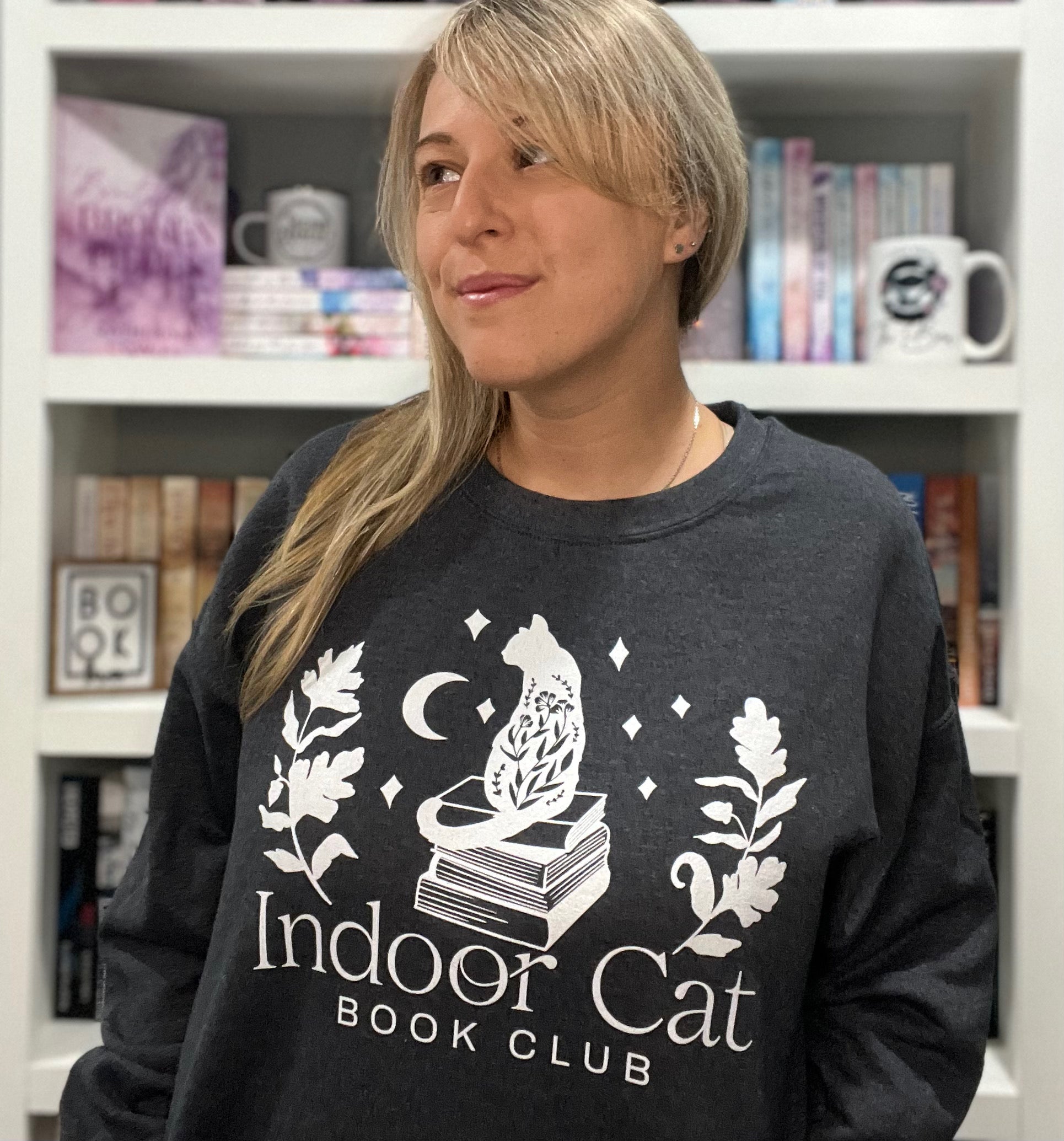 Dark heather indoor cat crew neck sweatshirt by FireDrake Artistry™. Modeled by @samsbookstagram
