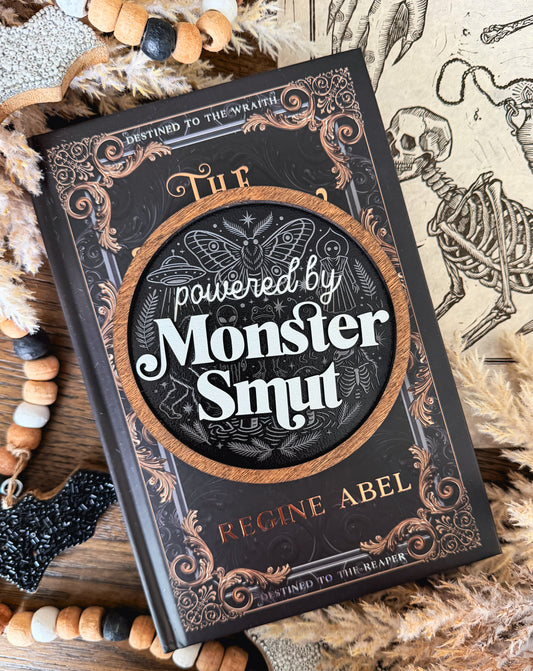 Powered by Monster Smut Shelf Sign