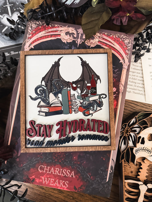 Read Monster Romance Shelf Sign