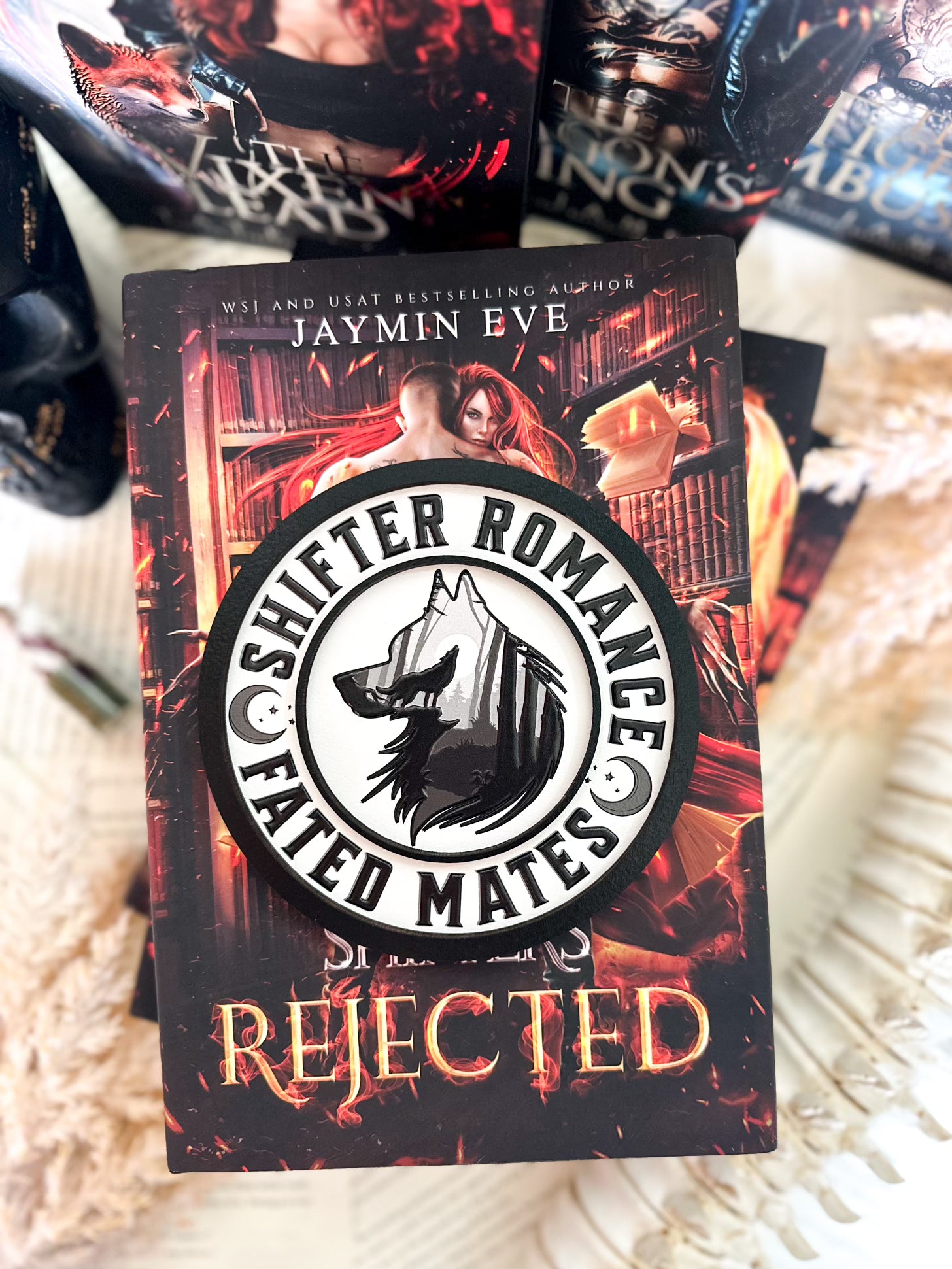 Shifter Romance - Fated Mates Round. White wooden round sign with a black border, UV printed wolf design with circling text that reads "SHIFTER ROMANCE FATED MATES". 2025 FireDrake Artistry®