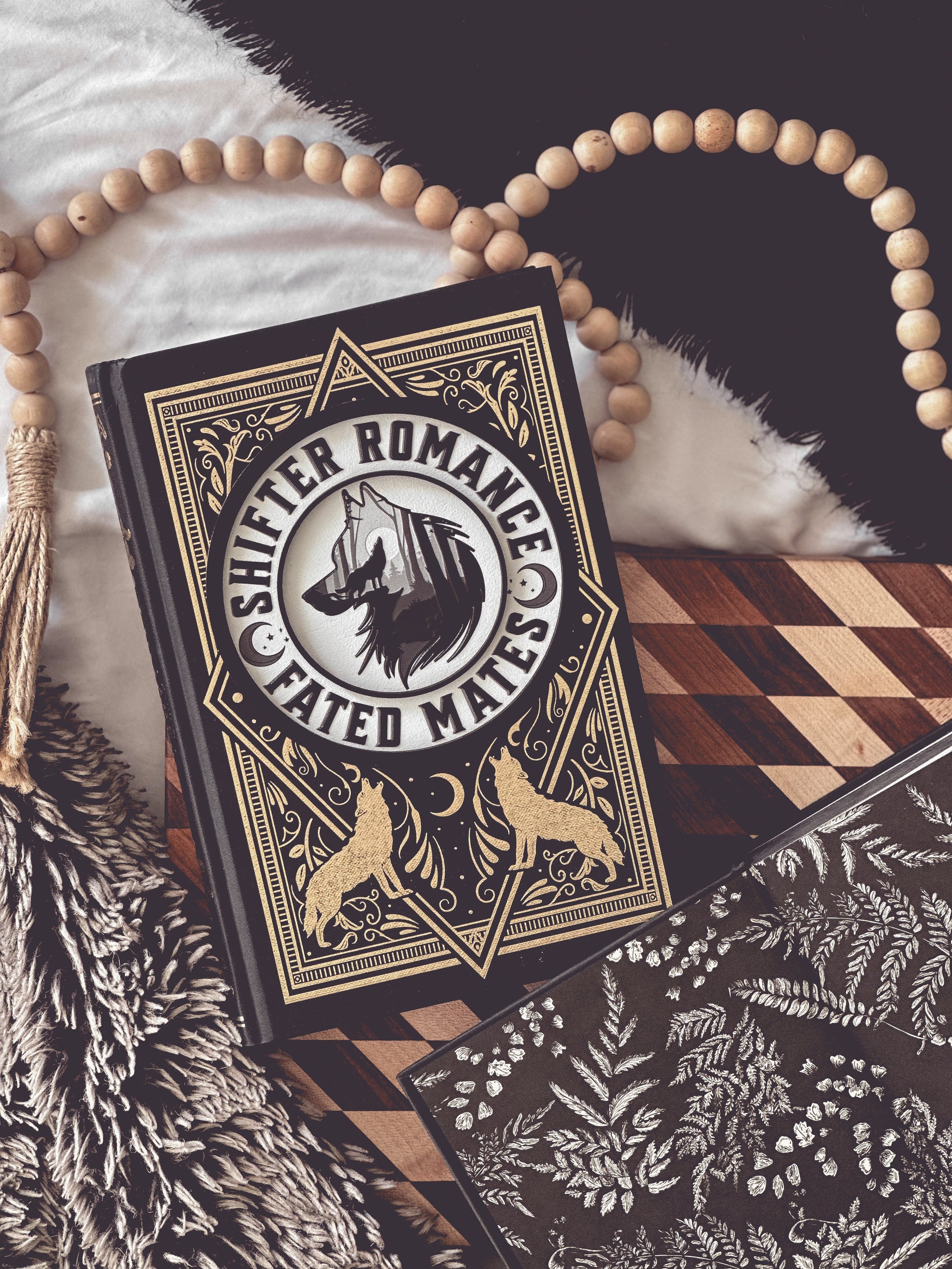 Shifter Romance - Fated Mates Round. White wooden round sign with a black border, UV printed wolf design with circling text that reads "SHIFTER ROMANCE FATED MATES". 2025 FireDrake Artistry®