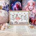 Load image into Gallery viewer, Tis the Season Ghosts Sign - Pink Fall version. A decorative wooden sign featuring UV-printed cartoon ghosts, pumpkins, and the phrase 'tis the season'. FireDrake Artistry 2025
