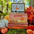 Load image into Gallery viewer, Tis the Season Ghosts Sign - Orange Fall version. A decorative wooden sign featuring UV-printed cartoon ghosts, pumpkins, and the phrase 'tis the season'. FireDrake Artistry 2025

